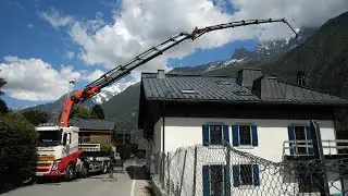 Mise en place de meubles avec une grue de 38 m - S.E Levage - Palfinger 135T/M sur Volvo FH4 540