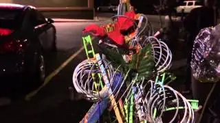 Street artist Gypsy with found object sculptures.  Oakland.
