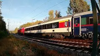 Schotterzug mit 232 182-6 und NightJet mit 101 145-1 am Morgen bei Saarmund