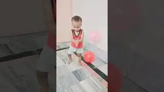 Joyful Child Playing with Colorful Balloons #trending #viral #cutebaby #youtubeshorts