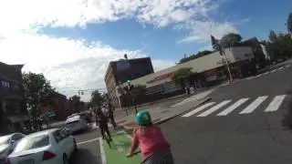 Cop holds traffic to help cyclists get around blocked bike lane