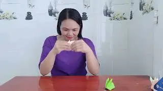 FOLDING A MINI RABBIT WITH SUPER BEAUTIFUL LIGHT YELLOW PAPER IN A FEW FOLDING STEPS MODEL 02