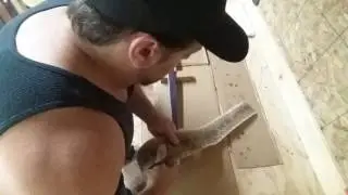 Applying Diamondback Rattlesnake skin to hickory longbows