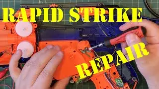 Repairing some of the electronics of a Nerf Rapid strike.
