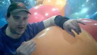 mw blowing an orange balloon for my collection 2011
