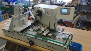 Automatic labelling of plastic cards with LAB510
