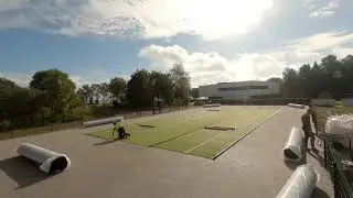 Artificial grass tennis court installation