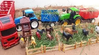 Fazendinha de brinquedo construindo cerca para os animais com trator