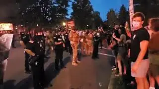 All of Us Demonstrator Taunts Police