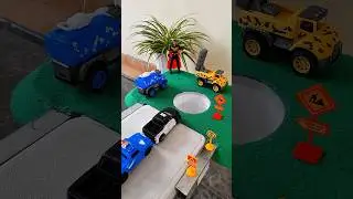 Jcb big car pushing police car and yellow bus in pit