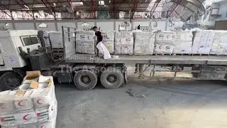 Trucks carrying aid make their way into Gaza City for the first time in months