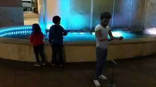 Google Pixel playground Childish Gambino performing infront of waterfall