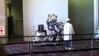 Robot riding at car show