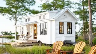Stunning 34-foot tiny house perched proudly in the middle of the rainforest leaves everyone in awe