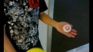 Wei Xuan Puts a Yoyo Into a Balloon