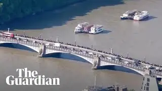 Thousands of people queue in London to see Queen's lying in state