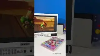 Switch OLED in the dock, Slim PVM WIDE on the desk and Diddy Kong on screen 🔥