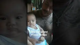 Prince Thomas 3 months with Papa Benjie
