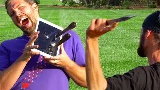 How Far Away Can World Champion Knife Thrower Hit iPad Pro 9.7