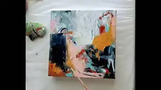 Creating a small acrylic abstract painting.