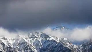 Winter time lapse in high Himalayan country around Shrikantha peak, with cloud and snow interplay