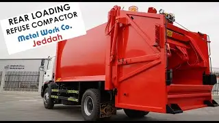 REAR LOADING REFUSE COMPACTOR 22 CUBIC YARD WITH 2 CUBIC YARD CONTAINER