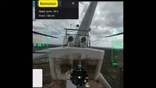 Drone Wind Turbine Tower cleaning washing. UAV high-pressure wind turbine tower washing.
