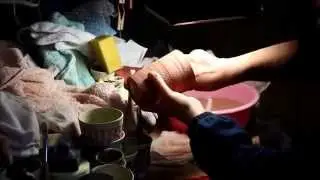 finishing the edge of pottery cup by Tokoname Kenji kiln