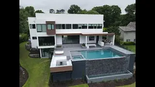 Modern Pool with Infinity Edge & Floating Firepit | Contemporary Outdoor Living