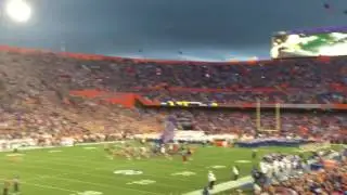 Steve Spurrier as Mr. Two Bits followed by Gators Entering the Swamp