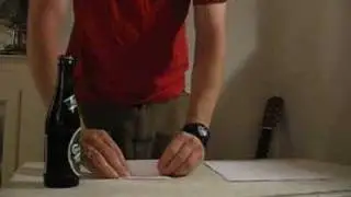 How to open a bottle of beer with a piece of paper