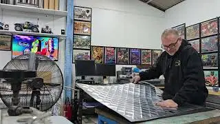 Bead rolling and stress relieving a quilted aluminium panel,in the Alikat Workshop