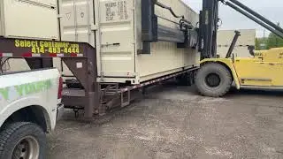 Picking up a One Trip Shipping Container