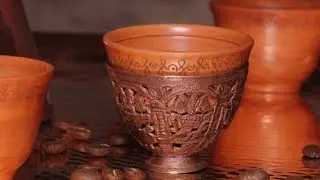 Zarf, an ornamental metal cup shaped holder for a hot coffee cup