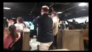 Irish fans in Dublin Airport celebrate parrot winner in Budapest