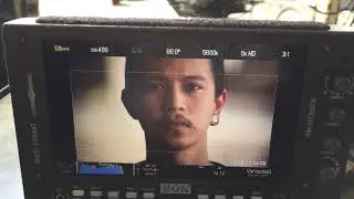 Track in on 250mm ( on Angenieux 25-250) , keeping focus.