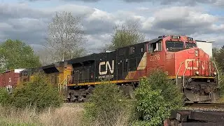 CN M399 (with UP trailing) and X139 @ Haslett, MI (5/7/25)