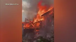 Fire Crews Continue To Spray Water On Smoldering House Fire In Roxborough Park