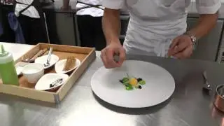 Dzemat prepares a dish at Linn&eacute;a Art Restaurant in Gothenburg