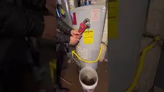 Fixing a leaky pressure relief valve on a gas water heater. #shorts #plumbing
