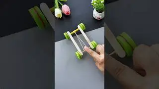Use small bottle caps, ice cream sticks and rubber bands to make your own powered car #handmadeDIY