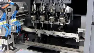 Optomec's Aerosol Jet Integrated into a custom 4-head production machine for printing antenna