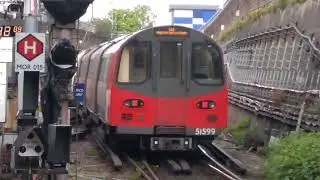 1995 stock departing Morden with Met-Cam motors