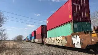 CN 3862 pulls intermodal and autorack train through the countryside
