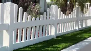 Vinyl Picket Fence in Landscaped Front Yard