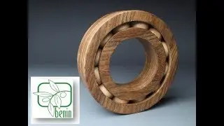 Wooden ball bearing on the lathe (from Matthias Wandel)