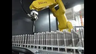 Robotic machine tool loading/unloading, automatic positioning