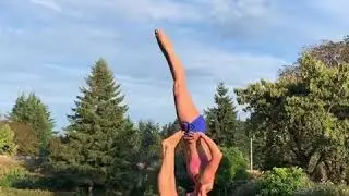 Male Acrobat Shows Off Talent By Balancing and Flipping Woman on Himself - 1099505-2