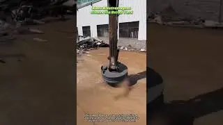 Giant Electromagnet Cleans the Scrap Yard