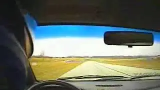 Spinning a Dodge Neon off a race track!